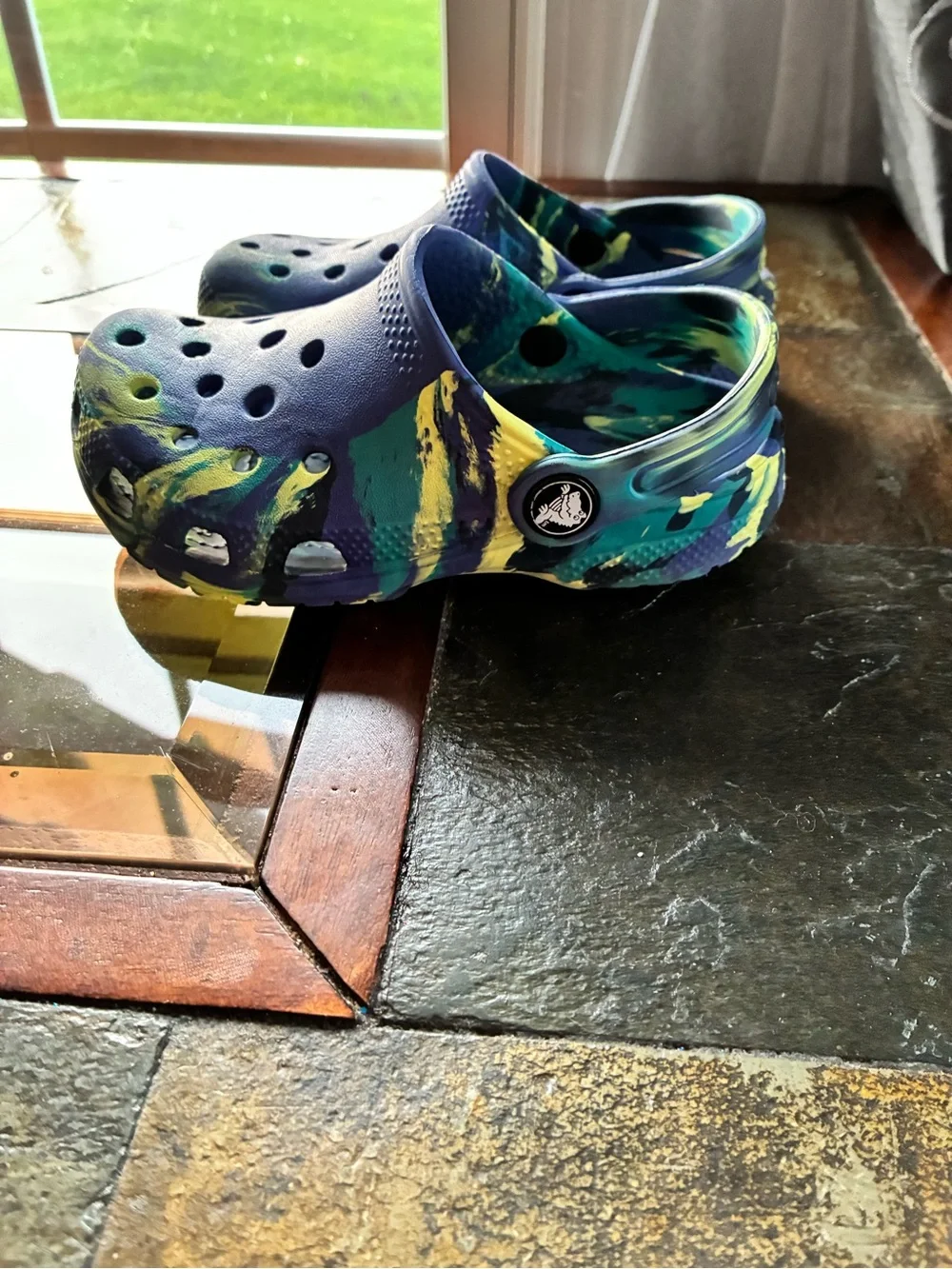CROCS Kids Slip-On Clogs in Blue with Green and Yellow Swirl